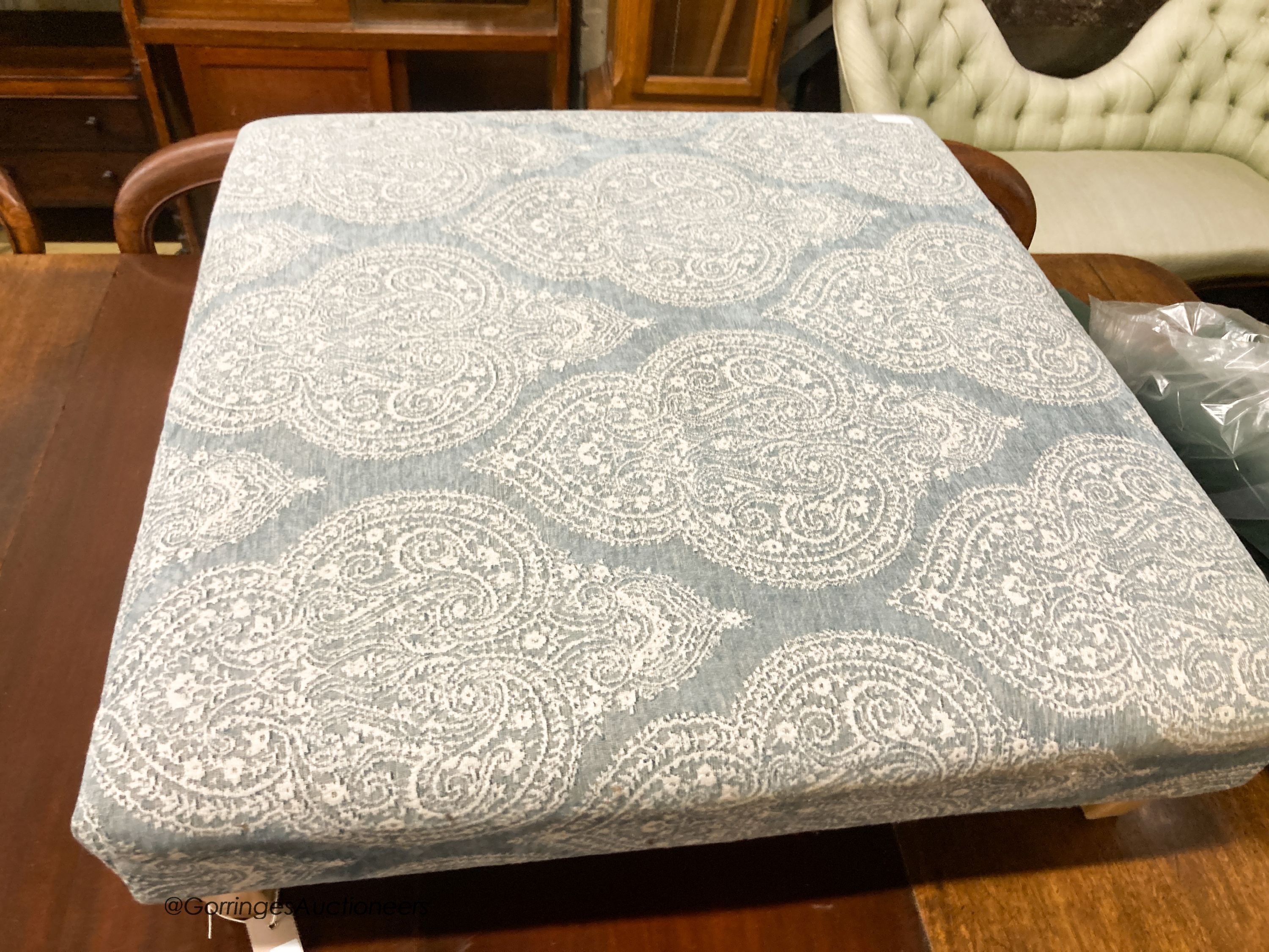 A contemporary foot stool, in Colefax Fowler upholstery, length 94cm, depth 90cm, height 28cm